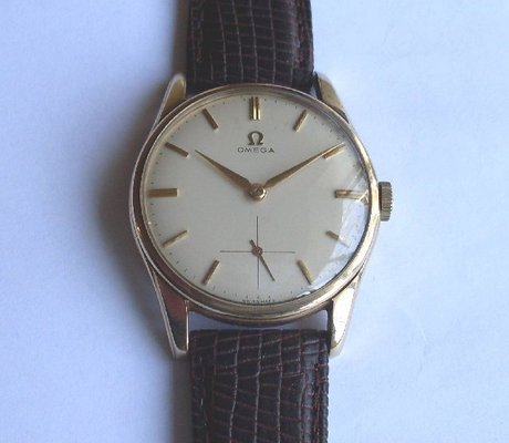 Omega men's gold wristwatch 1960