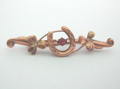 9 ct Gold Ruby Horseshoe Brooch